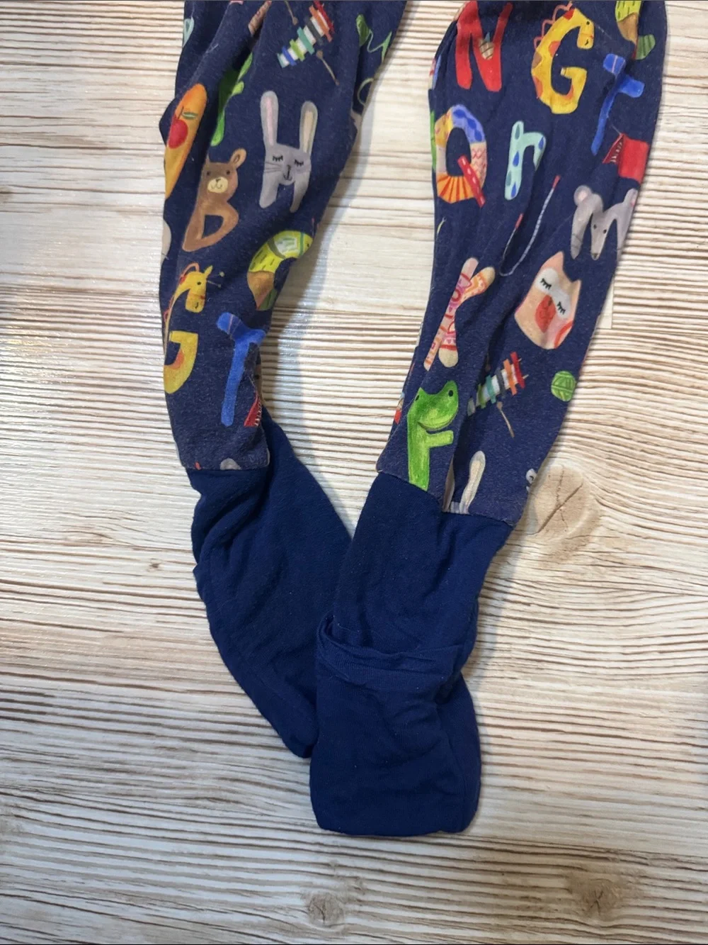 Little Sleepies Navy Alphabet Footed Pajamas with Multicolor Letters
